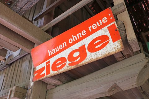 Schild Ziegel - Bauen ohne Reue