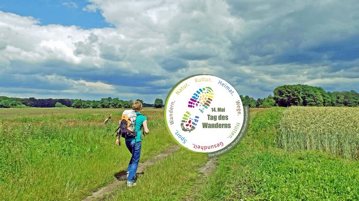 Wandermotiv mit Logo zum jährlichen Tag des Wanderns 